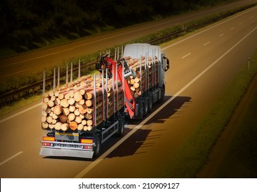 Logging Truck On The Highway.