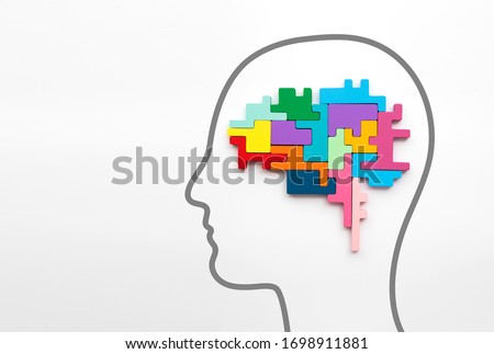 Logical brain concept. Brain made from omplex puzzle pieces in a human head