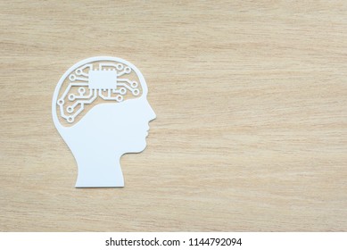 Logical Thinking Concept : Electronic Circuit With IC Or Integrated Circuit As Human Brain In Outline Head, Depicts The Mental Process In Which One Uses Reasoning Consistently To Come To A Conclusion