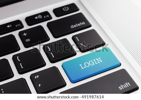 LOGIN : Close up green button keyboard computer. Digital Business and Technology Concept.