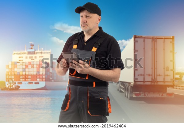 Logistic transport. Man logistician chooses\
transport to send. Portrait of logistician with tablet. Cargo ships\
and a truck behind him. Concept - logistician chooses logistics\
transport.