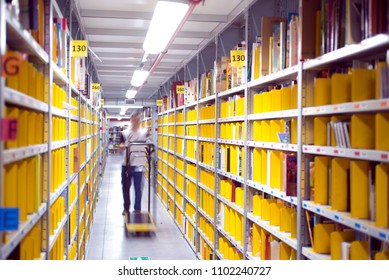 Logistic Warehouse, Interior With A Picker Working
