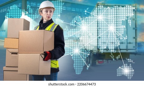 Logistics Business. Woman Logistician Is Holding Boxes. Girl Is Employee Of Logistics Company. Concept Of International Logistics Transportation. World Map And Lorry Behind Logistician Woman