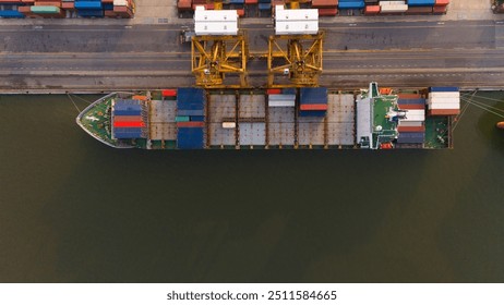 Logistics and container loading by large barges by sea in a harbor full of containers waiting to be transported.