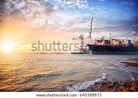 Logistics import export background of Container Cargo ship in the ocean st sunset sky, Freight Transportation