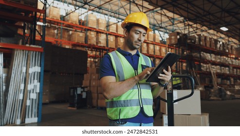 Logistics, man and tablet in warehouse for inventory, stock and price for safety in supply chain or freight. Male person, tech and quality control in industry, shipping in trade for commercial export - Powered by Shutterstock