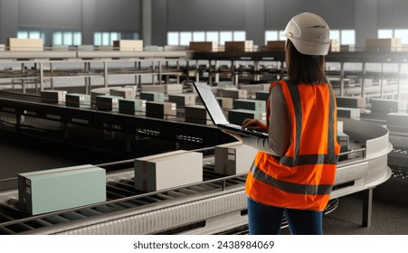 Logistics Manager Overseeing Automated Warehouse Operations with Laptop - Powered by Shutterstock