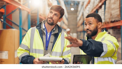 Logistics, people or discussion with tablet in warehouse for quality control, supply chain or cargo. Engineers, pointing and checklist for delivery tracking, stock management and freight inspection