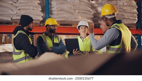 Logistics, team and laptop in warehouse for meeting, inventory management and compliance training. Woman operations manager, group and tech in storage for safety information, question and feedback - Powered by Shutterstock