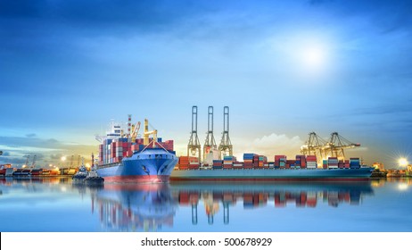 Logistics and transportation of International Container Cargo ship with ports crane bridge in harbor for logistics import export background and transportation industry.