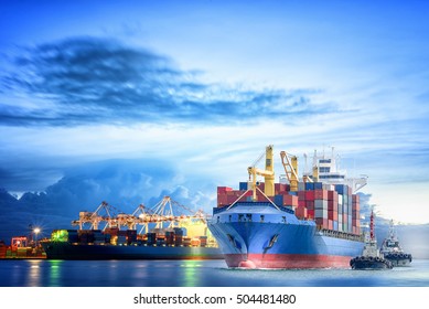 Logistics and transportation of international container cargo ship with ports crane bridge in harbor at dusk for logistics import export background and transportation industry - Shutterstock ID 504481480