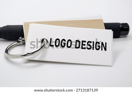 Logo design theme presented on white paper, showcasing identity creation and design element focus