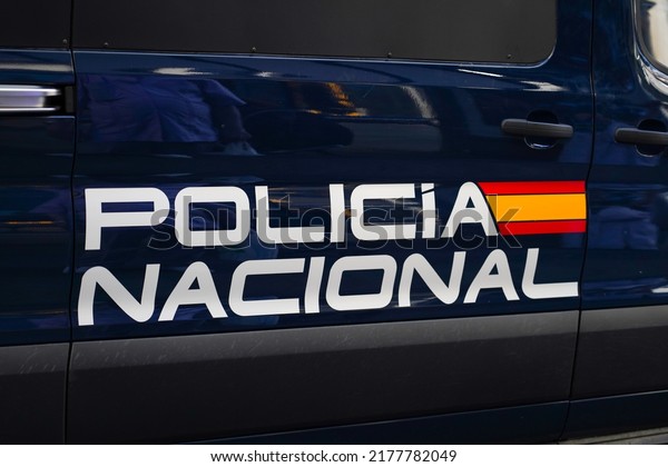 logo inscribed on a police car.\
national police, Madrid Spain. photo taken in June\
2022.