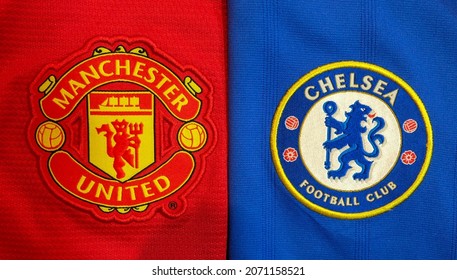 The Logo Of Manchester United And Chelsea Football Club On Home Shirt.