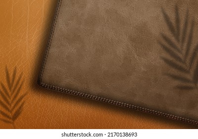 Logo mockup on leather box On a brouwn background with shadows