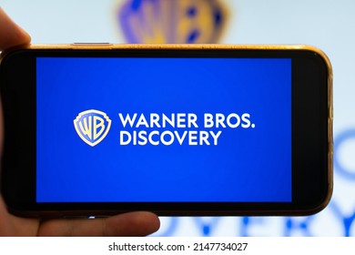 The Logo Of The New Warner Bros Discovery Company On Smartphone Screen. USA April 2022