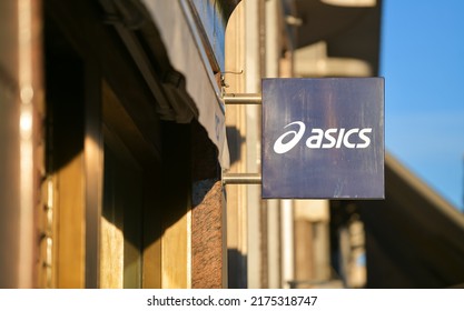 The Logo Sign Of An Asics Brand Sports Equipment Store. Spain, 2022