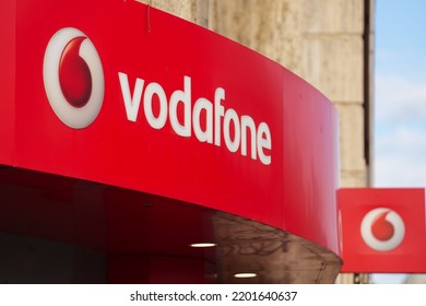 The Logo Sign Of Vodafone Telecommunication Company On Top Of A Store From Bucharest, Romania, 2022.