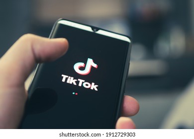 The Logo Of Tik Tok - A Popular Application For Watching Videos On A Black Smartphone. Barnaul. Russia. February 4, 2021