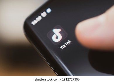 The Logo Of Tik Tok - A Popular Application For Watching Videos On A Black Smartphone. Barnaul. Russia. February 4, 2021