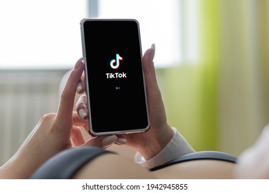 The Logo Of Tik Tok - A Popular Application For Watching Videos On A Black Smartphone. Barnaul. Russia. February 4, 2021