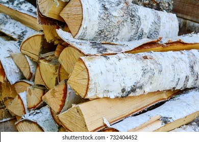Logs of birch firewood close-up