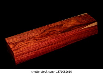 Logs Of Burmese Rosewood  At Blavk Background