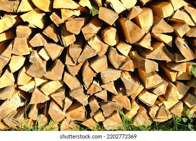 Logs Of Firewood Chopped On Logs In Woodpile, Logging For Winter, Concept Stoking Stove, Fireplace, Seasonal Cooling In Housing, Country's Economic Problems In Energy Sector, Shutdown Of Russian Gas