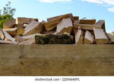 Logs Of Firewood Chopped Piled In Wooden Box, Logging For Winter, Concept Stoking Stove, Fireplace, Seasonal Cooling In Housing, Country's Economic Problems In Energy Sector, Shutdown Of Russian Gas