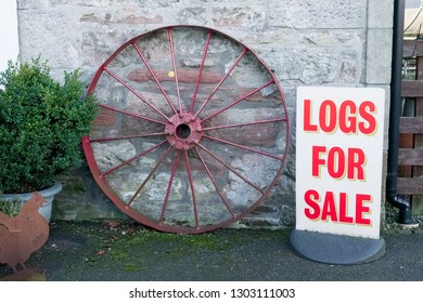 Logs Wood For Sale Sign At Farm Shop For Biomass Burner