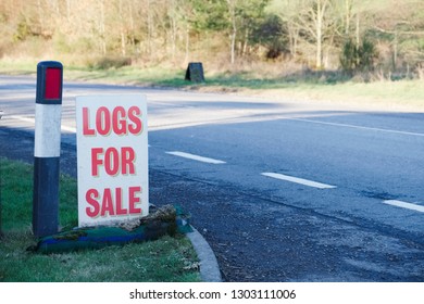 Logs Wood For Sale Sign At Farm Shop For Biomass Burner