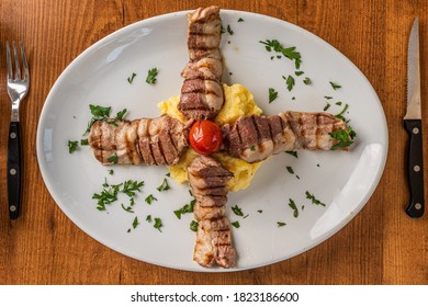 Lokum Kebab, traditional Turkish Lamb kebab served with homemade mezes and pide bread - Shutterstock ID 1823186600