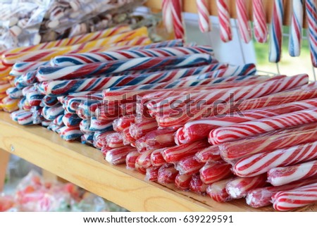traditional candy suckers in cellophane strip Traditional candy suckers in cellophane strip