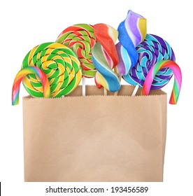 Lollipop Candy In Paper Bag Isolated On White Background