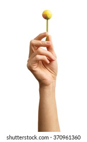 Lollipop In Female Hand Isolated On White Background. Alpha. Chupa Chups.