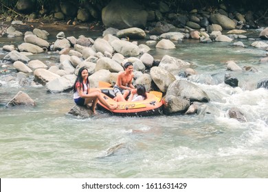 Lombok, 2/5/2017: Three-teenager Playing River Tubing.