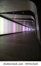 LONDON, 16 August 2016: Silhouette Of Man Walking At Kings Cross St Pancras Tube Station Walkway.