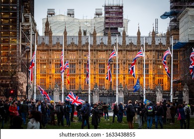 London, 31 Jan 2020 - BREXIT Day - Crowds waving flags to celebrate the UK departure from the European Union in Parliament Square, London, England, UK
