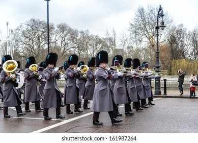 LONDON - APR 15: The changing of the guard ceremony at Buckingham Palace on April 15th, 2013 in London, UK. It is one of England's most popular visitor attractions.