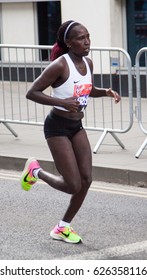 LONDON - APRIL 23, 2017: KIPLAGAT, Florence Runs In The Virgin Money London Marathon On April 23, 2017 In Isle Of Dogs. 