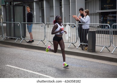 LONDON - APRIL 23, 2017: KIPLAGAT, Florence Runs In The Virgin Money London Marathon On April 23, 2017 In Isle Of Dogs. 