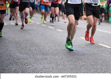 LONDON - April 24 2016. The London Marathon. The Race Was Founded By The Chris Brasher And John Disley. Close Up Legs. 