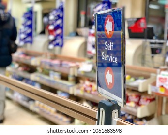 LONDON - APRIL 4, 2018: Self Service Checkout Queue Sign At Tesco Supermarket In London, UK.