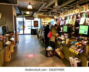 LONDON - APRIL 5, 2018: Customers Pay For Products At The Checkout In Whole Foods Market, Piccadilly, London, UK.