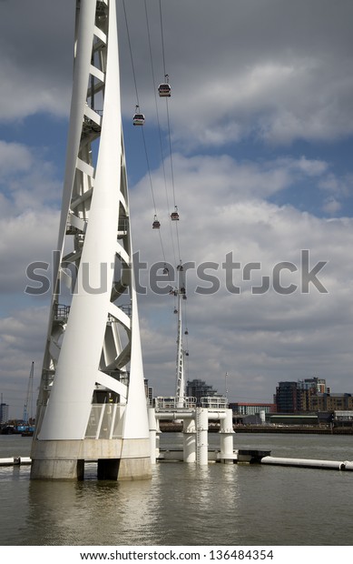 LONDON - APRIL 6: The
Emirates Air Line cable in East London on April 6, 2013 which has
carried over two million passengers and celebrates it's first year
in June 2013