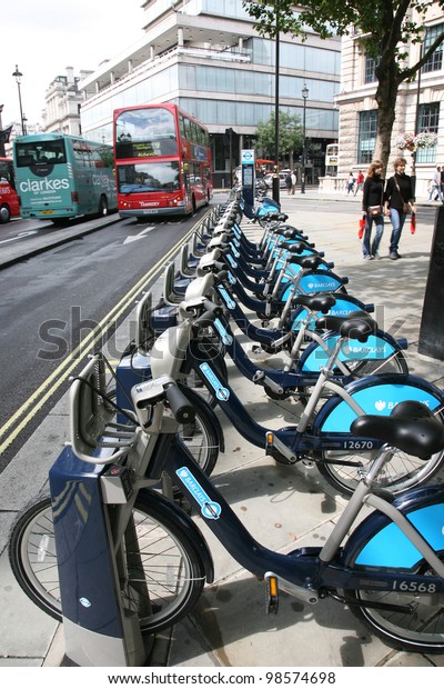 LONDON - AUG 13: Rental bicycles on Aug 13,\
2010 in London, UK. London\'s bicycle sharing scheme, launched with\
6000 bikes, 400 docking stations on 30 July 2010 to help ease\
traffic congestion.