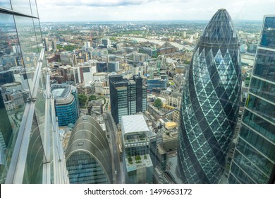 London - August 20, 2019: The tip of London's iconic Gherkin building from up high. London