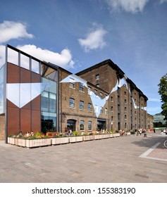 LONDON -� AUGUST 4. Granary Square is a new regeneration development with a dazzling ensemble of painted geometric graphics coordinating the many scattered buildings, on August 4, 2013 in London, UK. 
