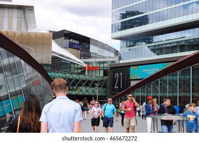 LONDON - AUGUST 8: Shoppers head towards the Westfield Shopping Centre on August 8, 2016 in Stratford, London.
