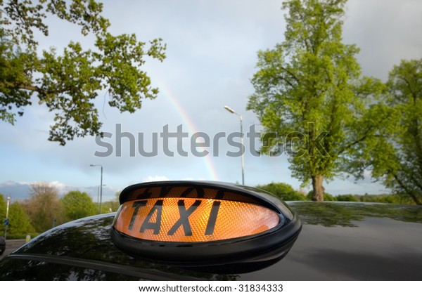 London Black Taxi Cab and\
Rainbow
